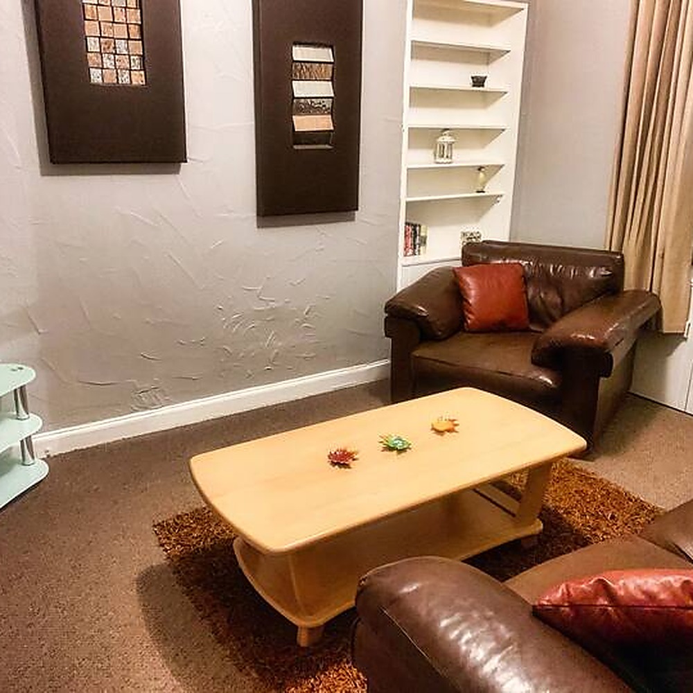 Living room at Alva Room Rentals