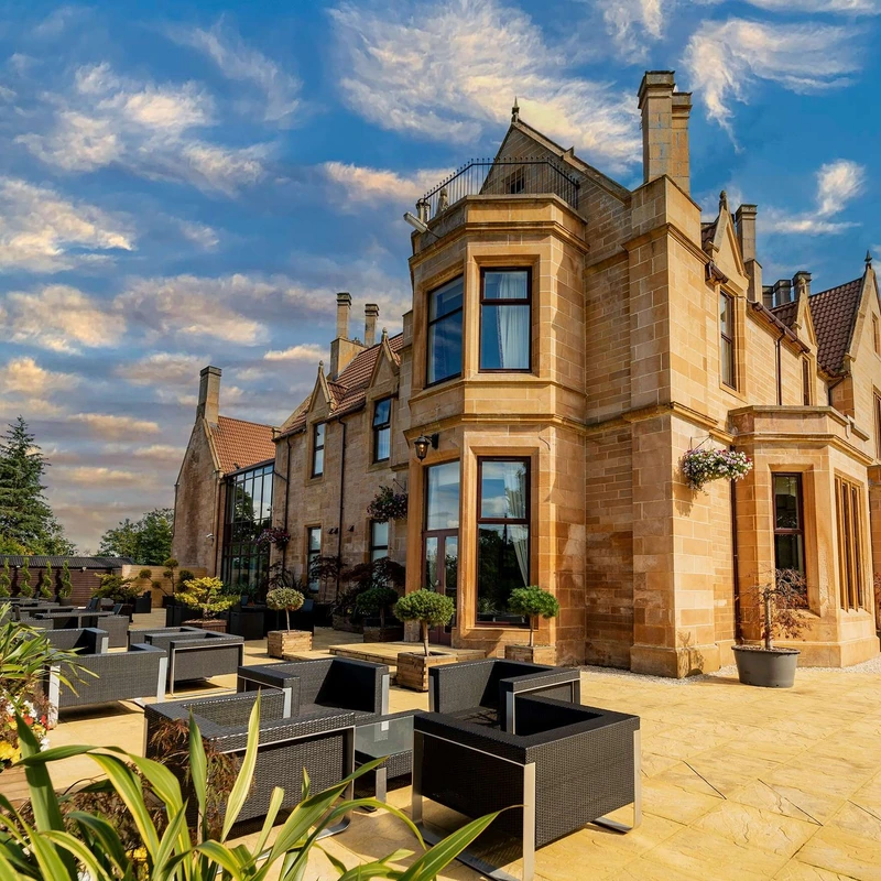 Victorian sandstone exterior and terrace at Glenbervie House & Country Estate