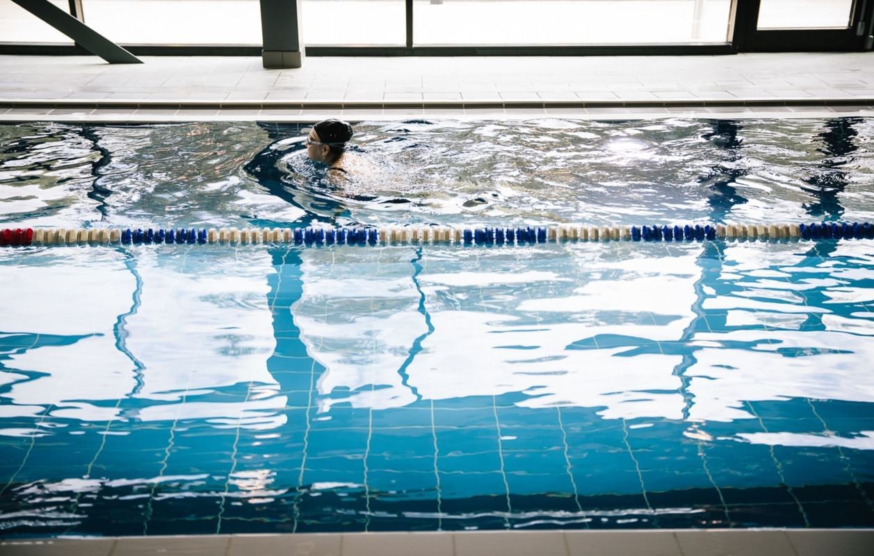 Swimmers using the indoor pool at Village Hotels