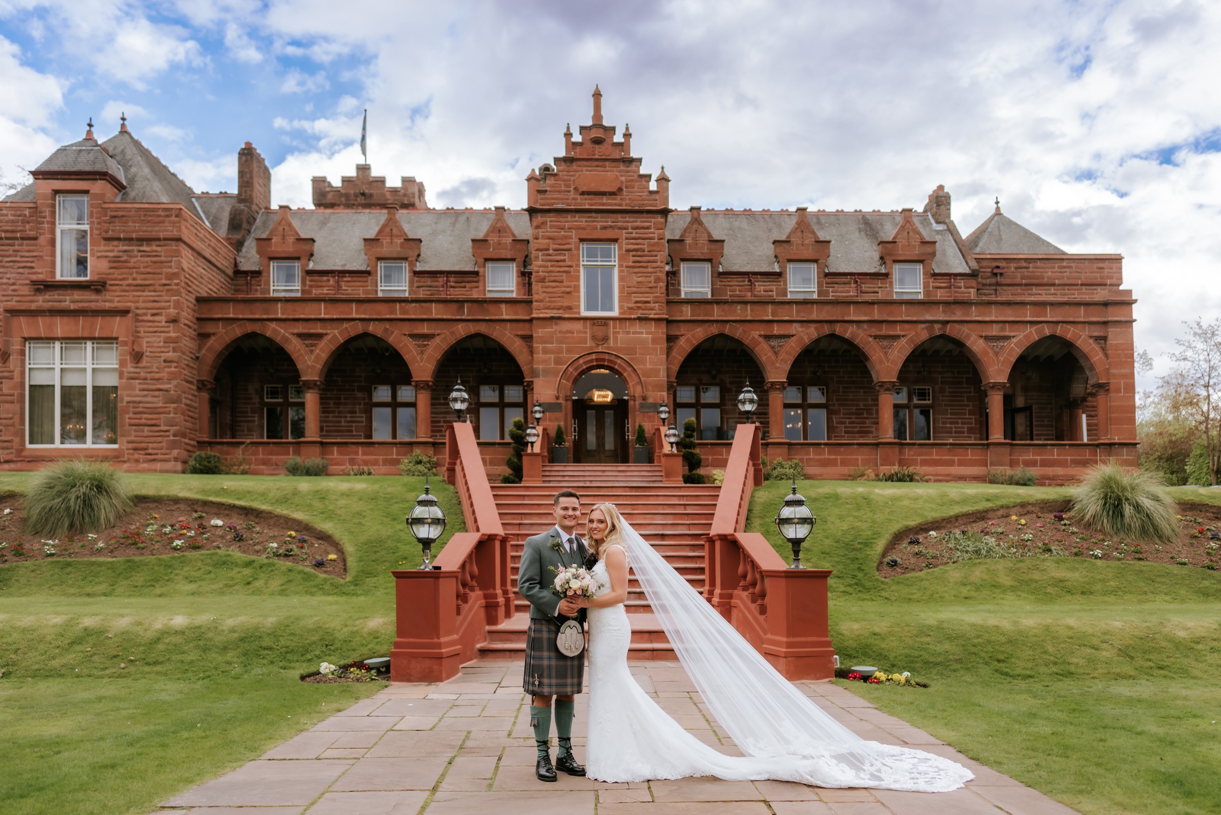 Newly married couple outside Boclair House