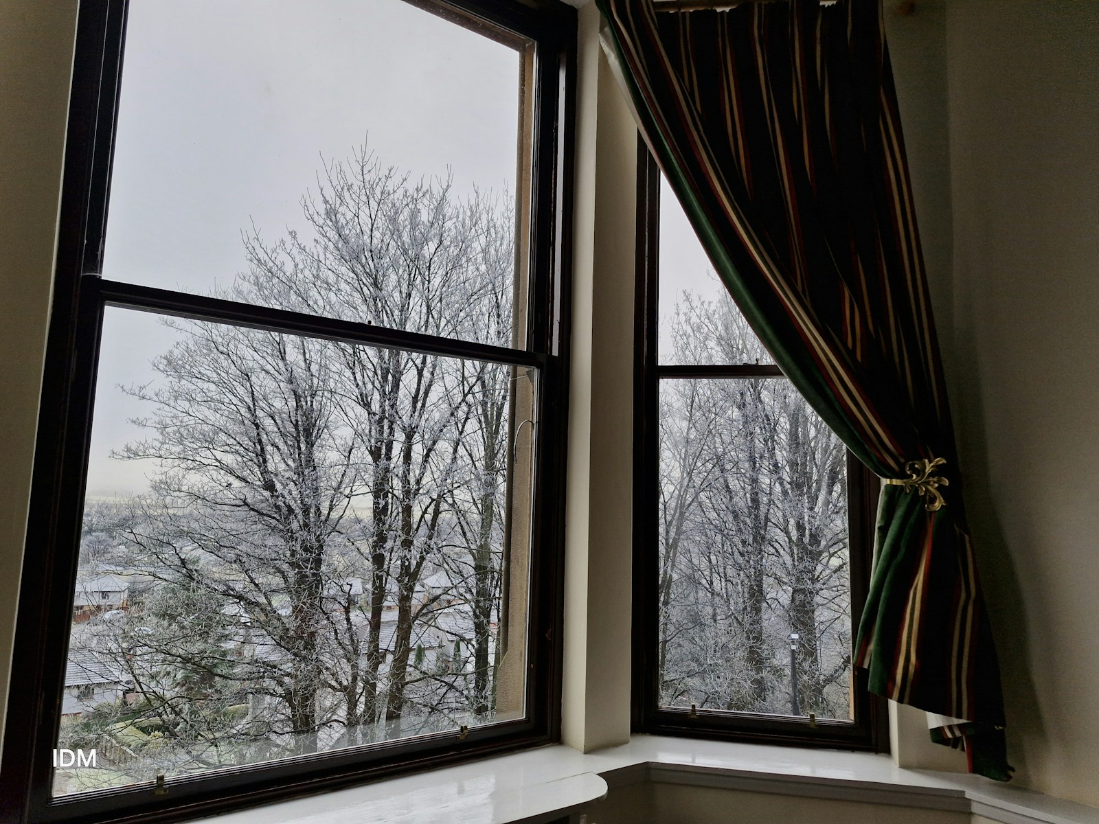 Winter view through a guest-room window at Broomhall Castle Hotel