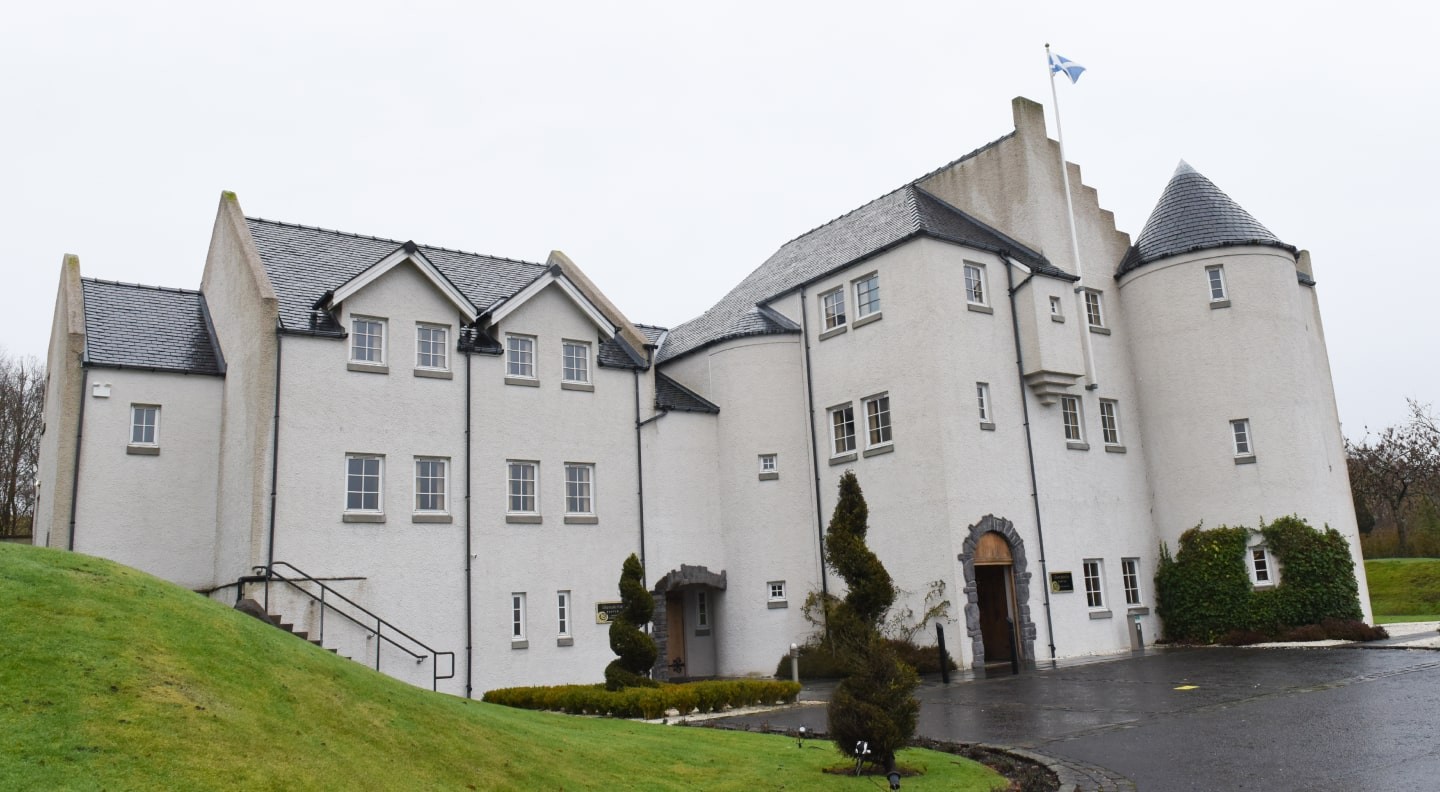 White castle exterior of Glenskirlie Castle Hotel.