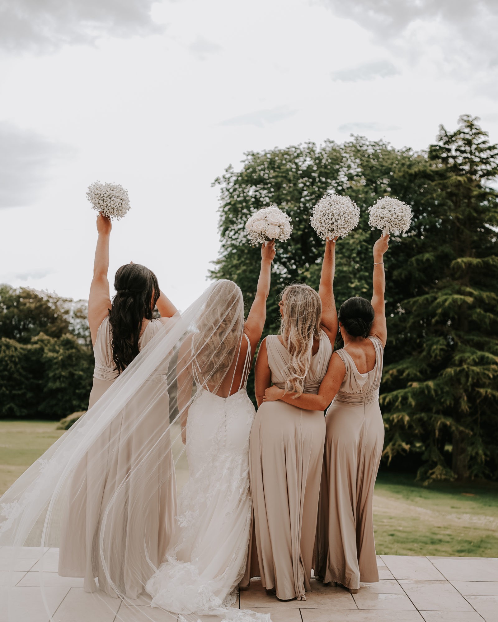 Bride and attendants in the grounds at Hetland Hall.