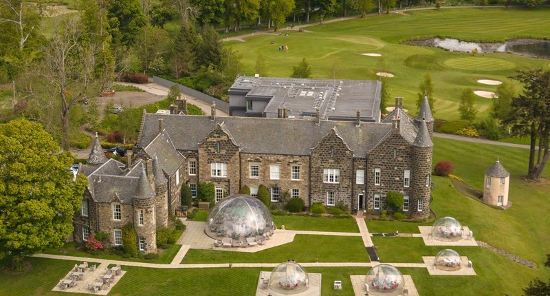 Aerial view of Meldrum House and its golf course.